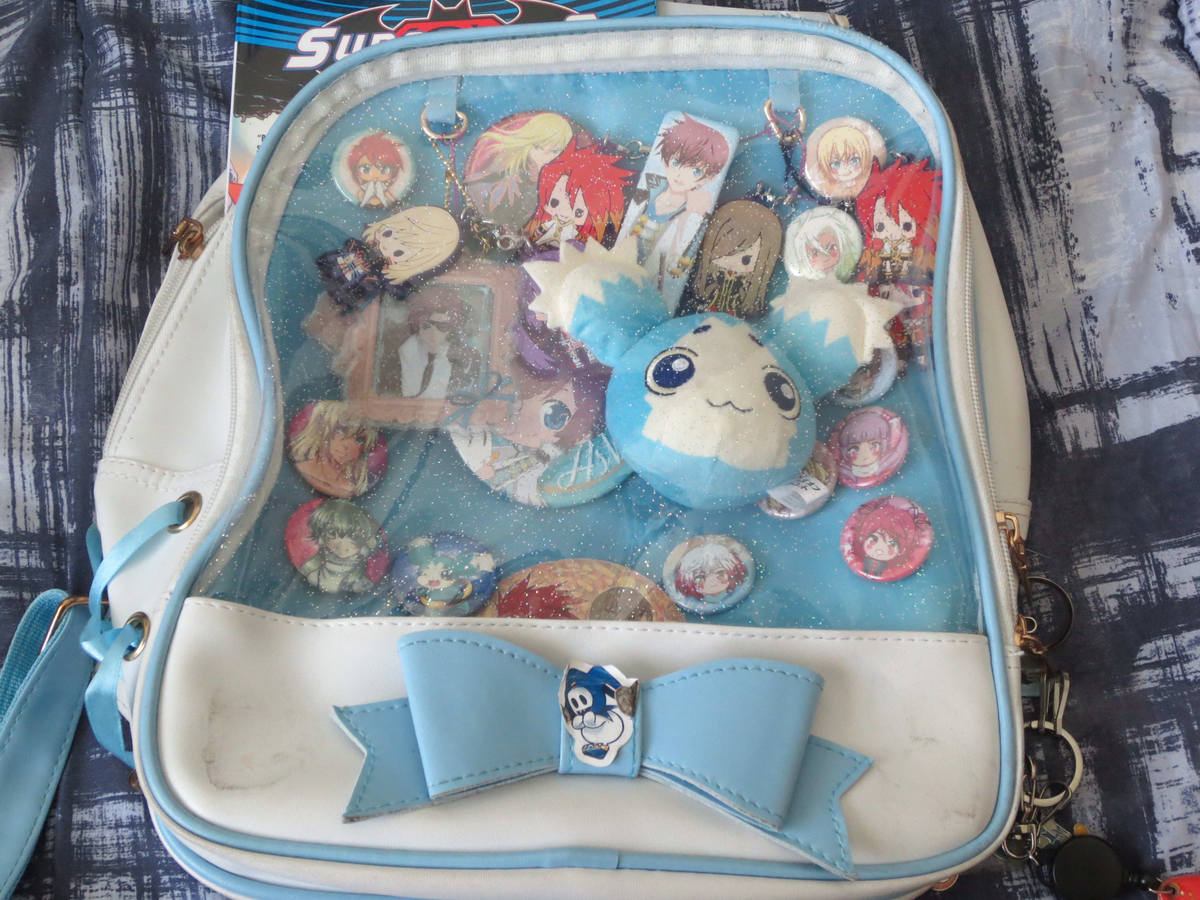 My ita-bag covered in Tales of Series merchandise